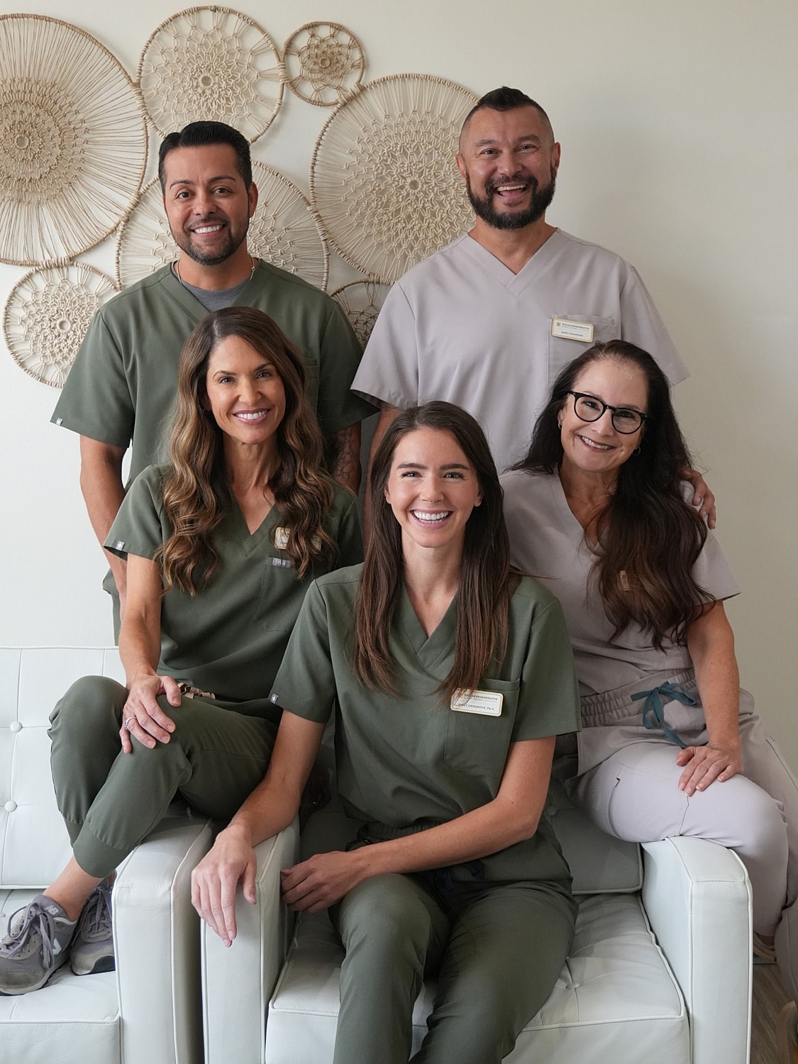 Woman enjoying sunlight outdoors with closed eyes.